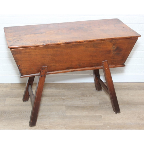 94 - An antique elm dough bin on wooden legs, likely 19th century, 106cm x 48cm x 75cm