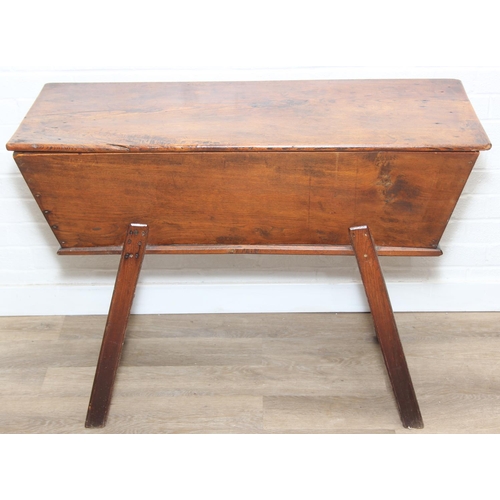 94 - An antique elm dough bin on wooden legs, likely 19th century, 106cm x 48cm x 75cm