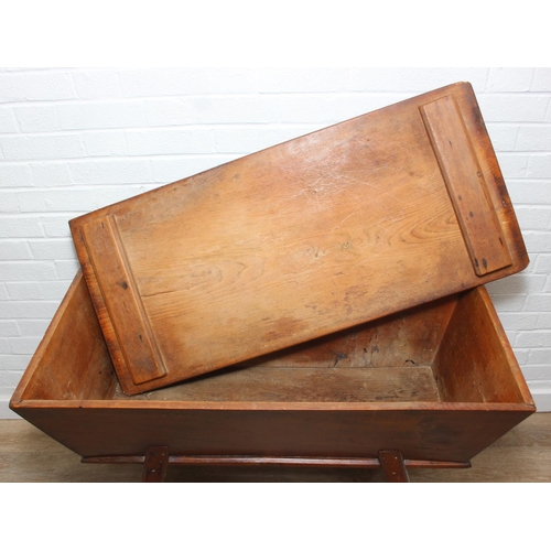 94 - An antique elm dough bin on wooden legs, likely 19th century, 106cm x 48cm x 75cm