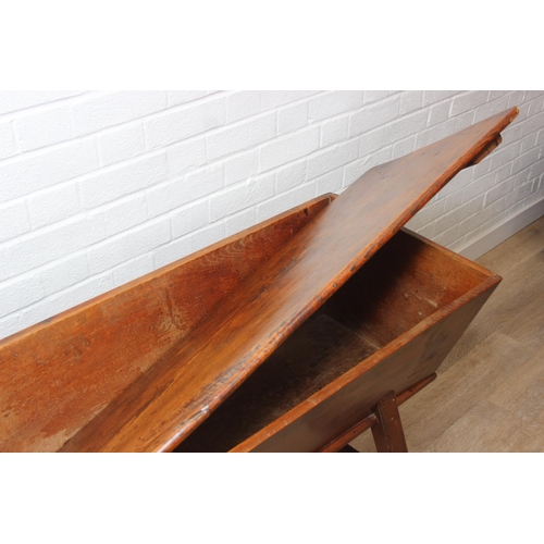 94 - An antique elm dough bin on wooden legs, likely 19th century, 106cm x 48cm x 75cm