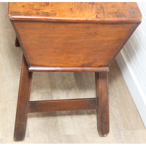 94 - An antique elm dough bin on wooden legs, likely 19th century, 106cm x 48cm x 75cm