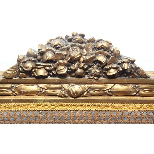 64 - A vintage single bed with gold painted carved wooden and bergère head and foot boards, side boards b... 