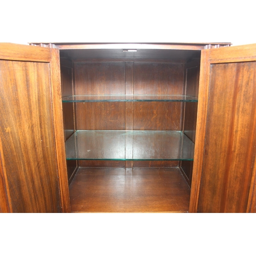 119 - Vintage oak tallboy compromising cupboard with two glass shelves over two drawers, 68cm x 44cm x 34c... 