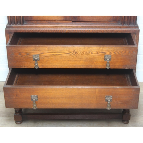 119 - Vintage oak tallboy compromising cupboard with two glass shelves over two drawers, 68cm x 44cm x 34c... 