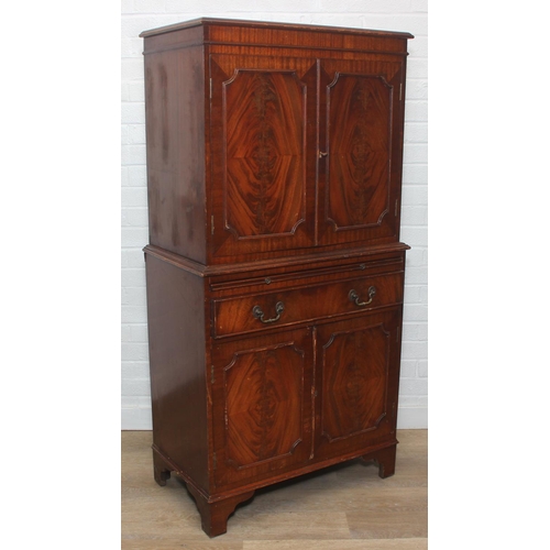 115 - Vintage mahogany cocktail cabinet with glass topped serving slide and drawer between two cupboards, ... 
