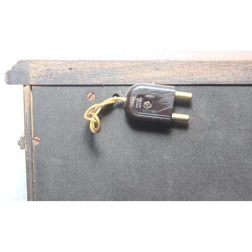 115 - Vintage mahogany cocktail cabinet with glass topped serving slide and drawer between two cupboards, ... 