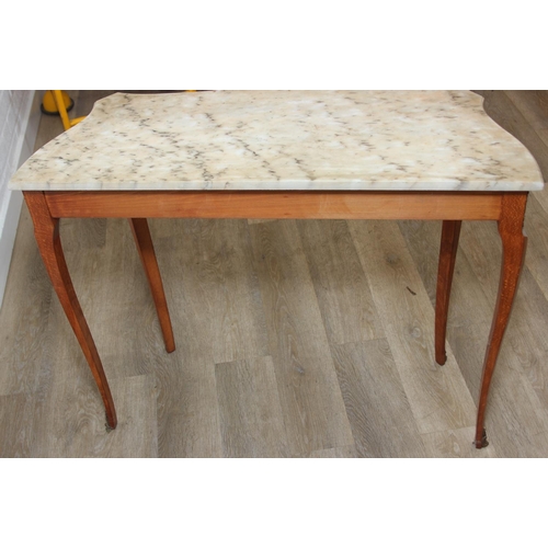 74 - An antique French marble-top console or side table, likely in the, Louis XV or Rococo style, believe... 