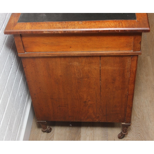 59 - An Edwardian three part desk with inset dark leather top and castors, brass fittings, 106cm x 55cm x... 