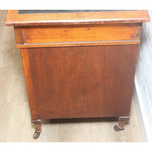 59 - An Edwardian three part desk with inset dark leather top and castors, brass fittings, 106cm x 55cm x... 