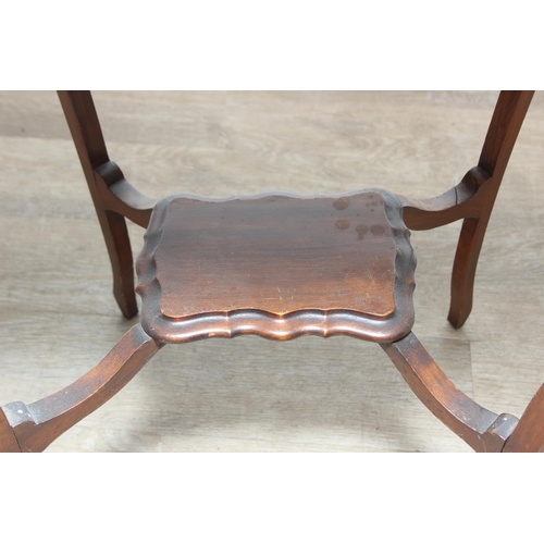 63 - An early 20th century mahogany side table with scalloped edge, 59cm x 39cm x 70cm