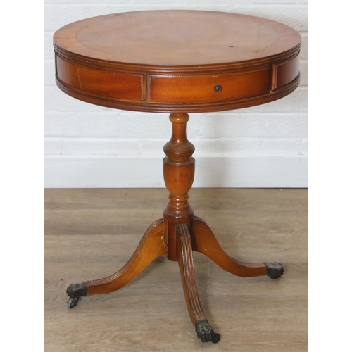 97 - An antique style drum table with round splayed legs, 49cm in diameter x 58cm tall