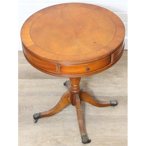 97 - An antique style drum table with round splayed legs, 49cm in diameter x 58cm tall