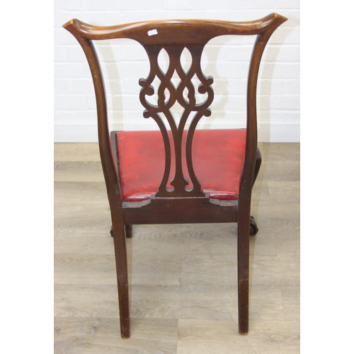104 - Set of four antique Chippendale style chairs with red leather upholstery and decorative carved backs... 
