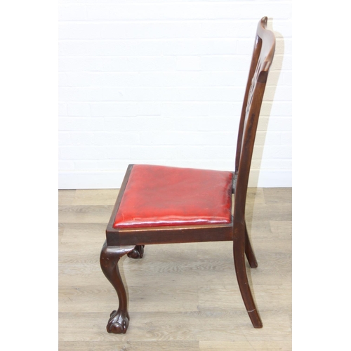 104 - Set of four antique Chippendale style chairs with red leather upholstery and decorative carved backs... 