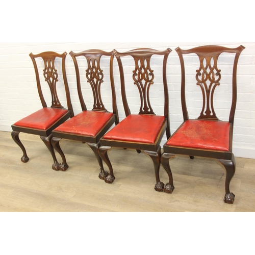 104 - Set of four antique Chippendale style chairs with red leather upholstery and decorative carved backs... 