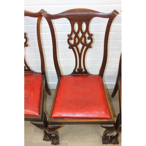104 - Set of four antique Chippendale style chairs with red leather upholstery and decorative carved backs... 