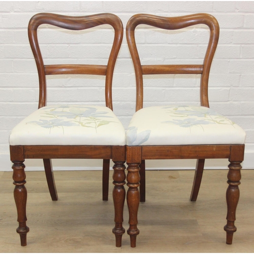 81 - A pair of Victorian mahogany side or bedroom chairs with later floral upholstery, each 82cm tall and... 