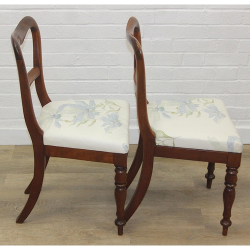 81 - A pair of Victorian mahogany side or bedroom chairs with later floral upholstery, each 82cm tall and... 