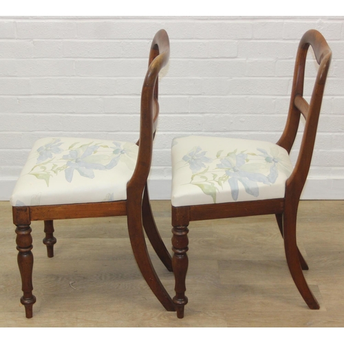 81 - A pair of Victorian mahogany side or bedroom chairs with later floral upholstery, each 82cm tall and... 