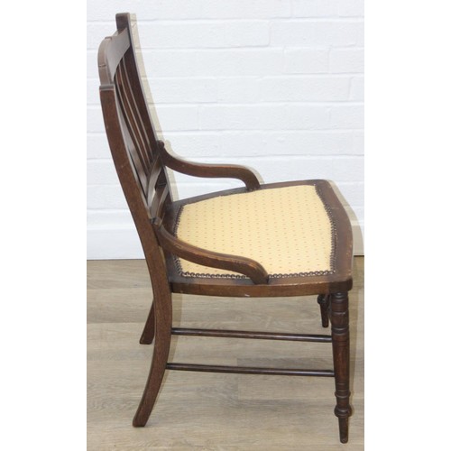 81 - A pair of Victorian mahogany side or bedroom chairs with later floral upholstery, each 82cm tall and... 
