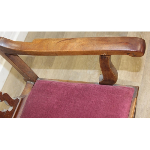 31 - Georgian elbow chair in the Chippendale style with puce velvet upholstery and pierced splat design, ... 