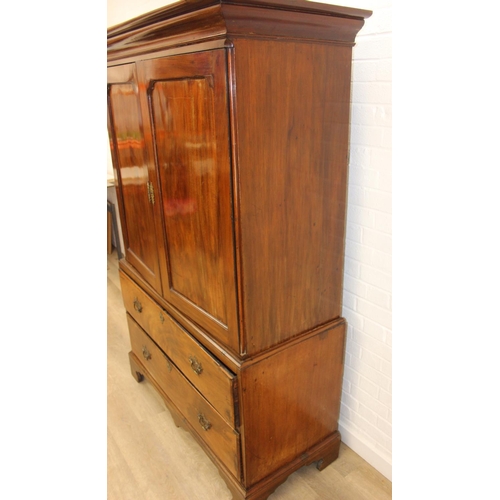 71 - A 19th century mahogany linen press with two drawers to base and converted single shelf to interior ... 