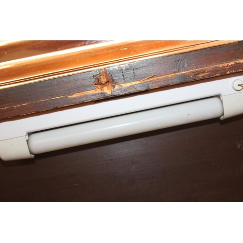 71 - A 19th century mahogany linen press with two drawers to base and converted single shelf to interior ... 