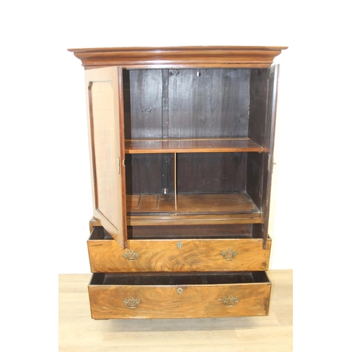 71 - A 19th century mahogany linen press with two drawers to base and converted single shelf to interior ... 