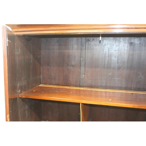 71 - A 19th century mahogany linen press with two drawers to base and converted single shelf to interior ... 