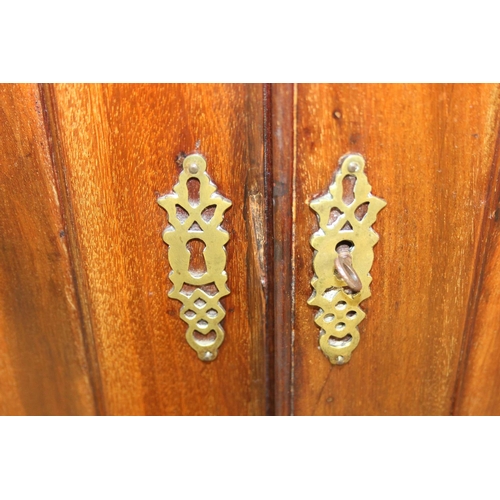 71 - A 19th century mahogany linen press with two drawers to base and converted single shelf to interior ... 