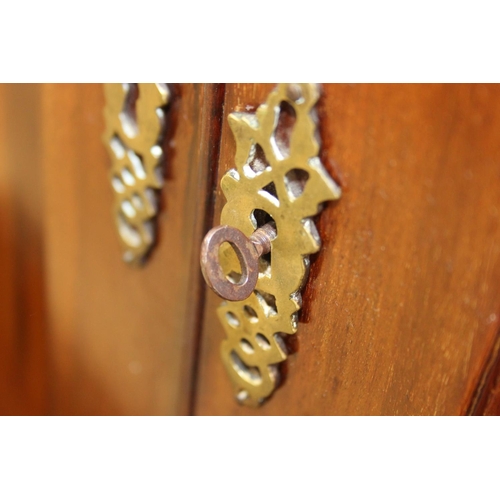 71 - A 19th century mahogany linen press with two drawers to base and converted single shelf to interior ... 