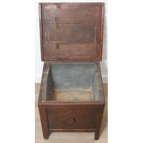 108 - An antique oak cellarette or coal bucket with metal lining, seemingly made from parts of an 18th cen... 