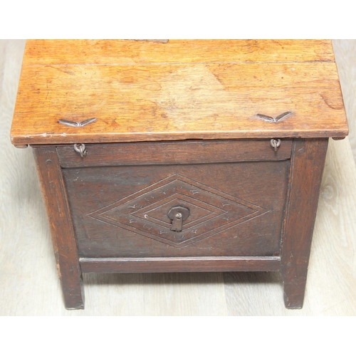 108 - An antique oak cellarette or coal bucket with metal lining, seemingly made from parts of an 18th cen... 