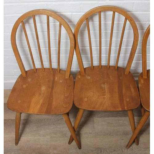 1 - A set of four Ercol hoop back dining chairs, blonde finish, each 85cm tall [4]