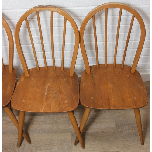 1 - A set of four Ercol hoop back dining chairs, blonde finish, each 85cm tall [4]