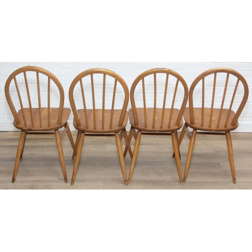 1 - A set of four Ercol hoop back dining chairs, blonde finish, each 85cm tall [4]