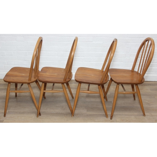 1 - A set of four Ercol hoop back dining chairs, blonde finish, each 85cm tall [4]