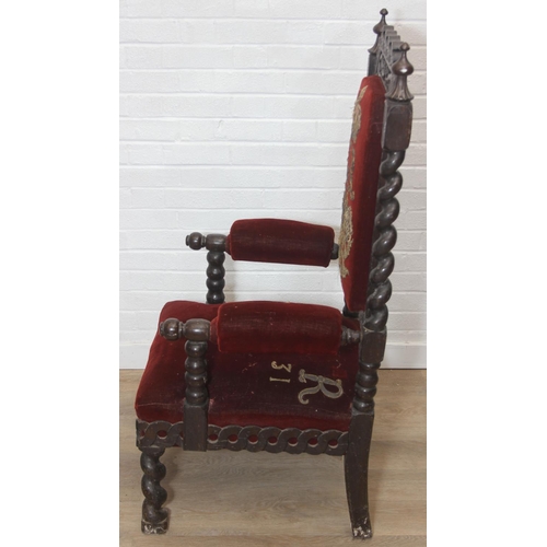 39 - An unusual antique carved oak throne chair with 1731 King George II related embroidery, the chair be... 