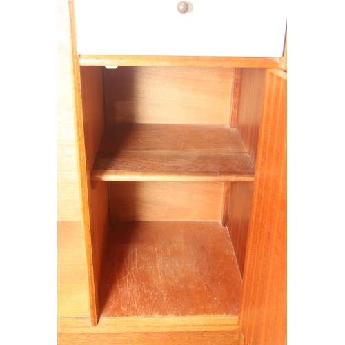 16 - G Plan [E Gomme] China White range bachelor’s tallboy or wardrobe, with cupboard door to the left op... 