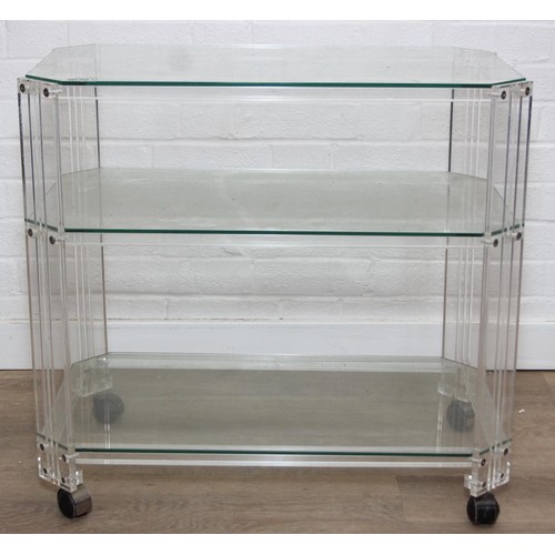 18 - A retro clear Perspex, Acrylic or Lucite serving trolley, three tiers with wheels, likely c.1980's, ... 