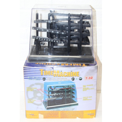 An unusual Time Machine ball clock in original box