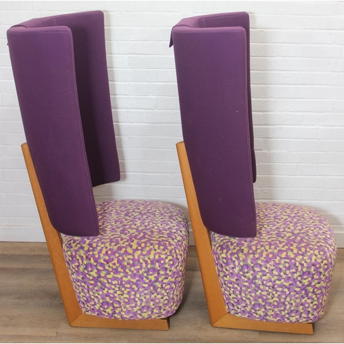 40 - A pair of very unusual high wing back armchairs of retro design, deep violet backs with speckled pur... 