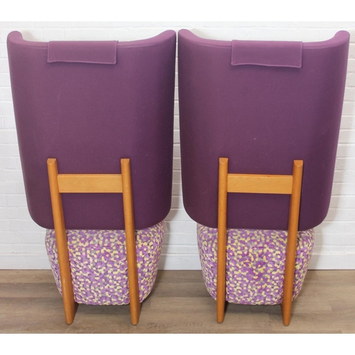 40 - A pair of very unusual high wing back armchairs of retro design, deep violet backs with speckled pur... 