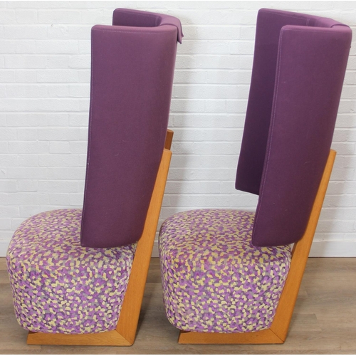 40 - A pair of very unusual high wing back armchairs of retro design, deep violet backs with speckled pur... 