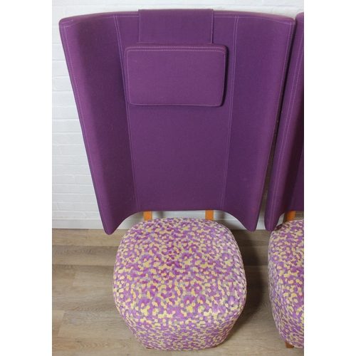 40 - A pair of very unusual high wing back armchairs of retro design, deep violet backs with speckled pur... 