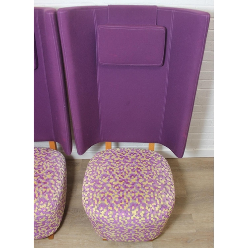 40 - A pair of very unusual high wing back armchairs of retro design, deep violet backs with speckled pur... 