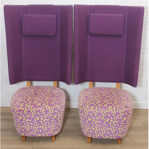 40 - A pair of very unusual high wing back armchairs of retro design, deep violet backs with speckled pur... 