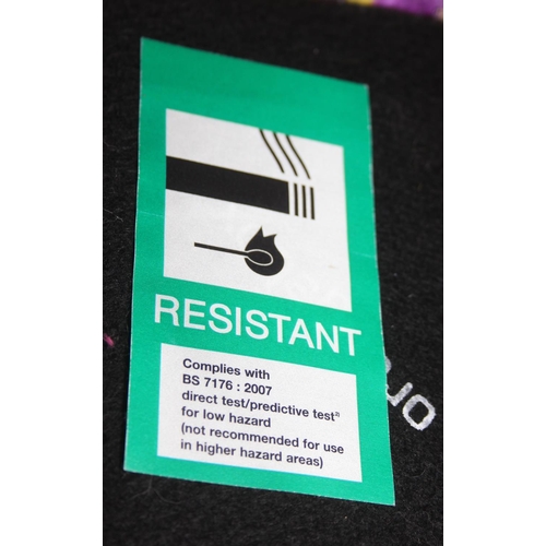 40 - A pair of very unusual high wing back armchairs of retro design, deep violet backs with speckled pur... 