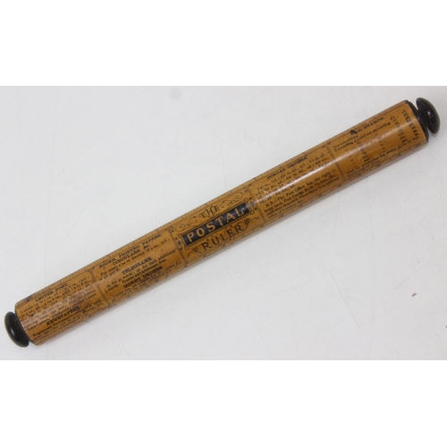 A rare Victorian mauchlineware cylindrical ruler 