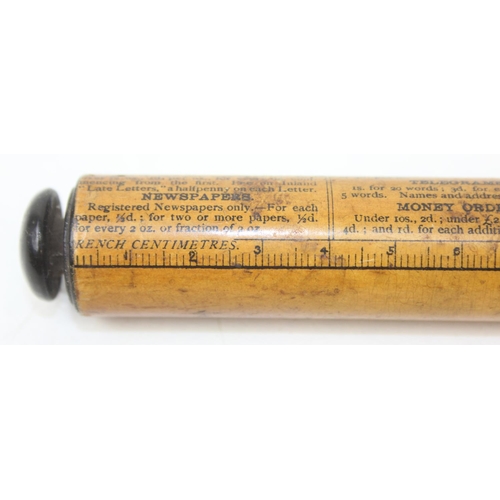 A rare Victorian mauchlineware cylindrical ruler 